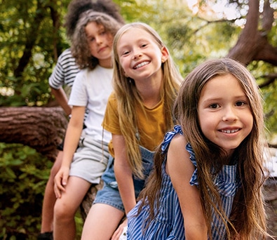 3 Kids playing out doors an example of share photos